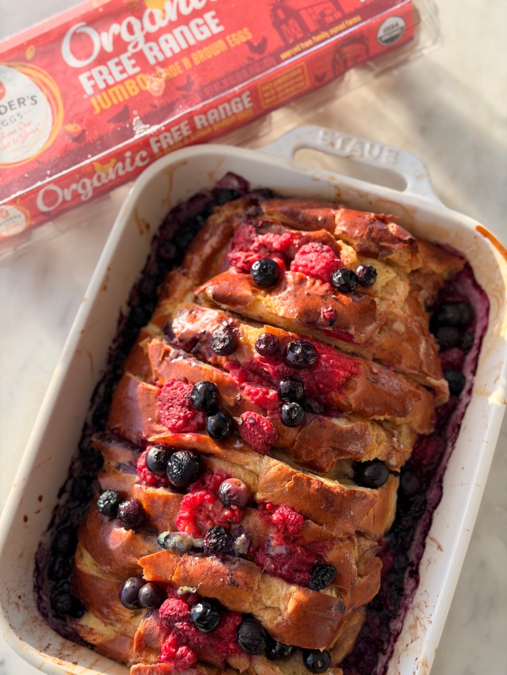 Baked french toast with berries in.a dish